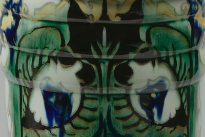 Detail of Theo Colenbrander's Peacock beaker vase