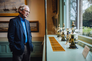 Man looking at art by Colenbrander in The Mesdag Collection